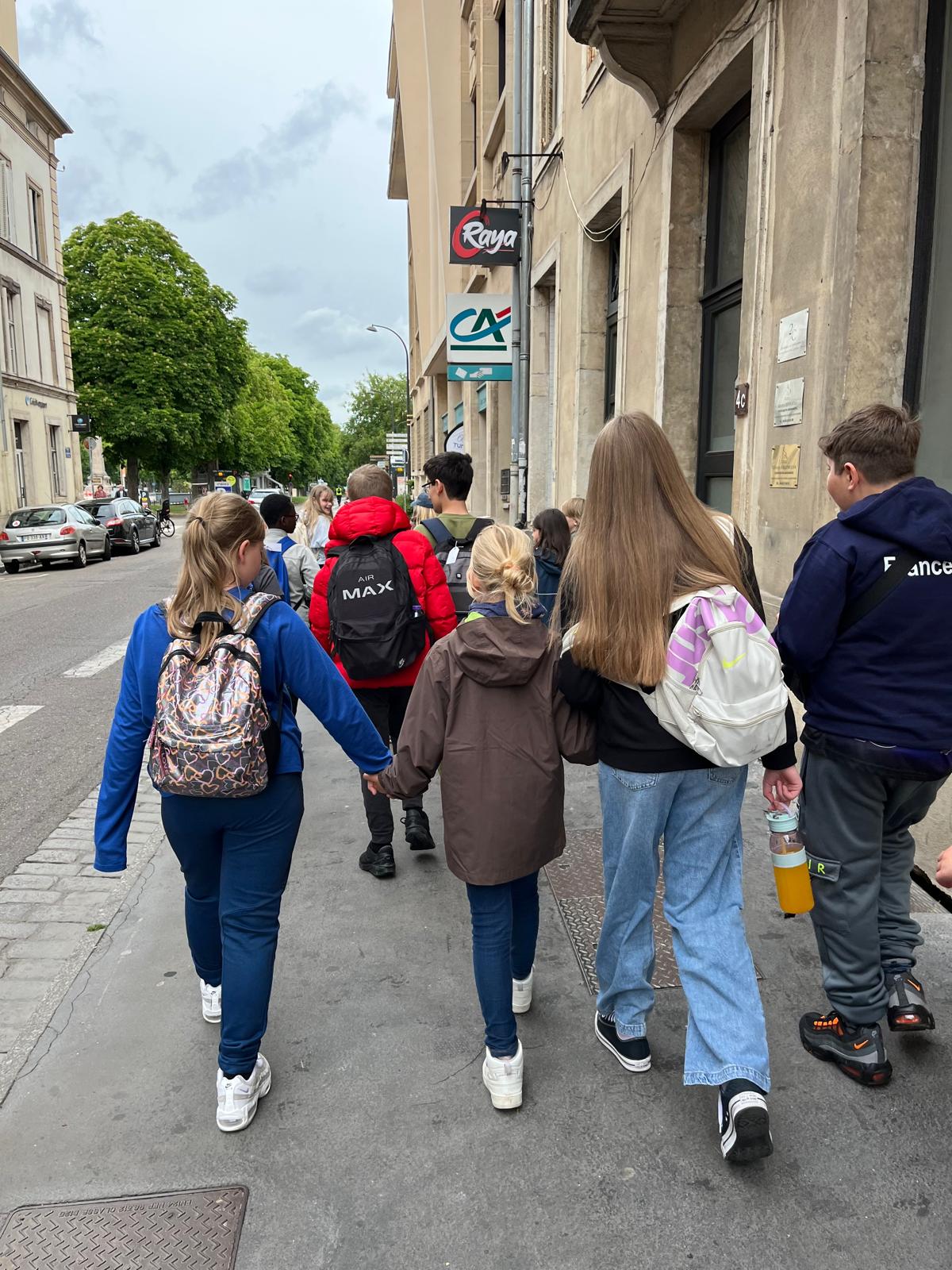 A lovely moment as Lemington Riverside and Boudonville pupils walk together through the streets of Nancy. A lovely moment as Lemington Riverside and Boudonville pupils walk together through the streets of Nancy.